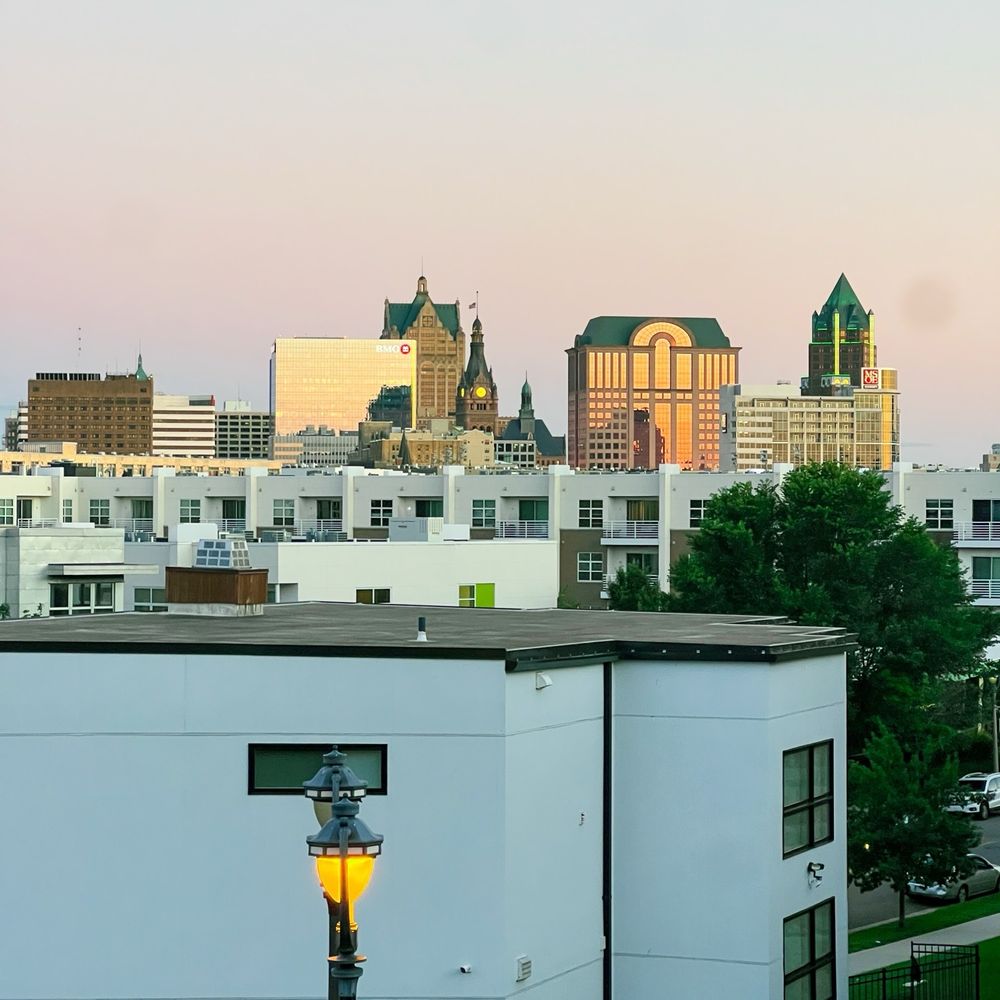 Avli - Skyline view as the sun sets - Greek Near Me - Milwaukee, Wisconsin Avli - Skyline view as the sun sets - Greek Near Me - Milwaukee, Wisconsin