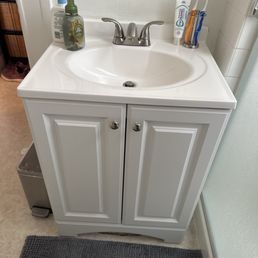 The new sink, base cabinet, and faucet.