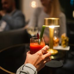 The Curtain Club - With an exciting drinks menu, including signature drinks and champagne classics, we provide you an authentic offer, inspired by the 20s.