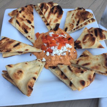 Embers - a plate of pita chips and salsa - New American Near Me - Claymont, Delaware