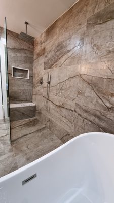 Bathroom remodel 2023 - Stunning Bathroom Remodel
Experience the elegance and functionality of our latest bathroom remodel. This luxurious space features:
- Spacious Walk-in Shower: Designed with large-format tiles and a seamless glass enclosure, it offers a modern and sleek look. The shower includes a rainfall showerhead and a handheld shower, providing a spa-like experience.
- Custom Vanity: The dual-sink vanity is equipped with ample storage, a beautiful marble countertop, and contemporary fixtures, ensuring both style and practicality.
- Elegant Tilework: The entire bathroom is adorned with high-quality, natural stone-inspired tiles that add a touch of sophistication and durability.
- Modern Lighting: Recessed lighting and chic wall-mounted fixtures illuminate the space, creating a warm and inviting ambiance.
Transform your bathroom into a luxurious retreat with our expert remodeling services. Contact us today to schedule a consultation! Bathroom remodel 2023 - Stunning Bathroom Remodel
Experience the elegance and functionality of our latest bathroom remodel. This luxurious space features:
- Spacious Walk-in Shower: Designed with large-format tiles and a seamless glass enclosure, it offers a modern and sleek look. The shower includes a rainfall showerhead and a handheld shower, providing a spa-like experience.
- Custom Vanity: The dual-sink vanity is equipped with ample storage, a beautiful marble countertop, and contemporary fixtures, ensuring both style and practicality.
- Elegant Tilework: The entire bathroom is adorned with high-quality, natural stone-inspired tiles that add a touch of sophistication and durability.
- Modern Lighting: Recessed lighting and chic wall-mounted fixtures illuminate the space, creating a warm and inviting ambiance.
Transform your bathroom into a luxurious retreat with our expert remodeling services. Contact us today to schedule a consultation!