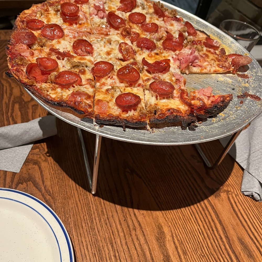 Eno's Pizza Tavern - Pig smiley pizza - Pizza Near Me - Forney, Texas