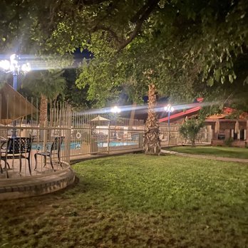 Best Western Swiss Clock Inn - Grass area next to the pool - Hotels Near Me - Pecos, Texas Best Western Swiss Clock Inn - Grass area next to the pool - Hotels Near Me - Pecos, Texas