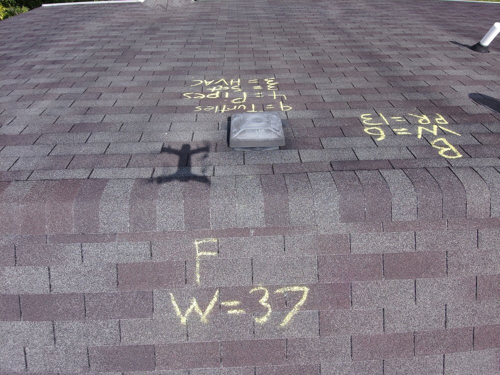 Slide of Cumming Roofing Company