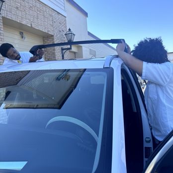 Quick Quack Car Wash - Employees trying to put on broken roof rack - Car Wash Near Me - Lodi, California Quick Quack Car Wash - Employees trying to put on broken roof rack - Car Wash Near Me - Lodi, California