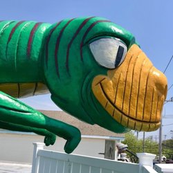 Club 18 Miniature Golf - Come see our friendly Dino that overlooks the street!