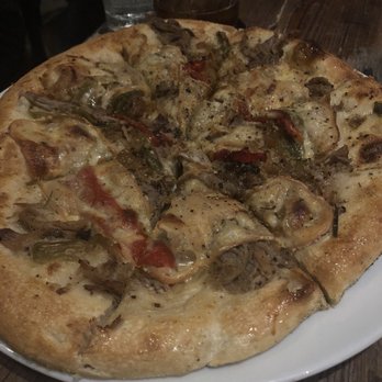 Coltivare - SHREDDED PORK PIZZA, LOCAL PEPPERS, GRILLED ONIONS, SMOKED CHEESE, SAUCE BIANCO, FENNEL POLLEN - Italian Near Me - Houston, Texas Coltivare - SHREDDED PORK PIZZA, LOCAL PEPPERS, GRILLED ONIONS, SMOKED CHEESE, SAUCE BIANCO, FENNEL POLLEN - Italian Near Me - Houston, Texas