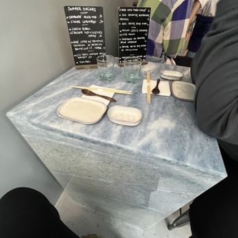 Takuto - Cute but most UNCOMFORTABLE table to sit at, solid pice of stone, no place for your legs. - Sushi Bars Near Me - Paris