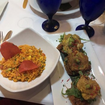 Ola Latin Kitchen - Patacones and vegetable saffron rice - Latin American Near Me - Bridgeport, Connecticut Ola Latin Kitchen - Patacones and vegetable saffron rice - Latin American Near Me - Bridgeport, Connecticut