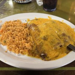 Taqueria Jalisco - The Thursday special - three beef enchiladas with rice and refried beans. They kindly substitute Charro beans,