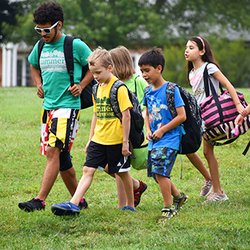 Summer at Sandy Spring - A counselor with his campers