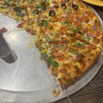 Pizza Twist - Half chicken curry (black olives topped pizza) and Chicken tikka pizza (delish!!!). - Pizza Near Me - Reno, Nevada