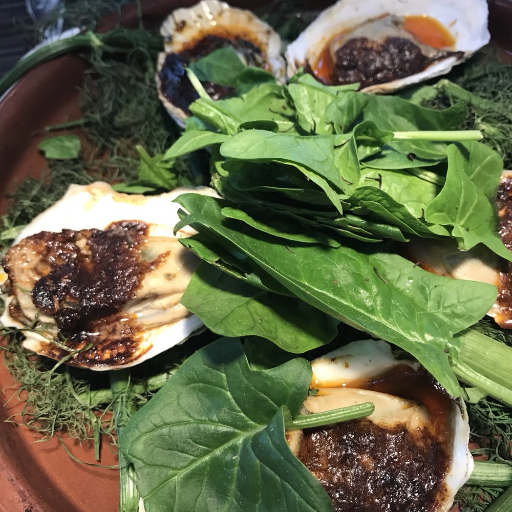 Gunther & Co - roasted oysters, oddly with a pile of raw spinach on top? - Seafood Near Me - Baltimore, Maryland Gunther & Co - roasted oysters, oddly with a pile of raw spinach on top? - Seafood Near Me - Baltimore, Maryland
