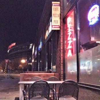 Zamboni's Pizza - View from the outdoor table on the sidewalk on 7th out front, looking back toward downtown St. Paul and Xcel Center (that curved building). - Pizza Near Me - Saint Paul, Minnesota