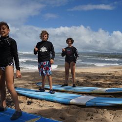 DFC Surfing Academy - Happy family time, 9yr old, 14 yr old and 16 yr old surfing!