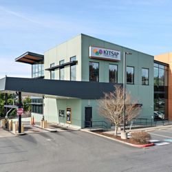 Kitsap Credit Union - Closer shot of the entrance area of the Silverdale Highlands branch, showcasing the drive-up access, entry walkway, US and WA...