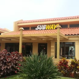 the entrance of a subway restaurant