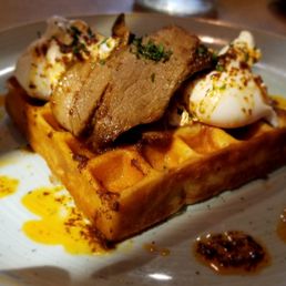 Beef Brisket and poached eggs on waffle Beef Brisket and poached eggs on waffle