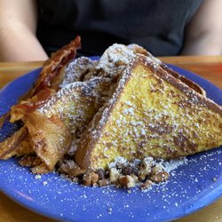 Stack'em High Pancakes & So Forth - French Toast, ordered with chocolate crunch (chocolate chips and pecans).  Side of bacon.
