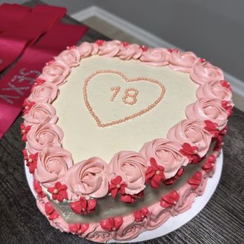 Katt's Kitchen - a heart shaped cake on a table - Desserts Near Me