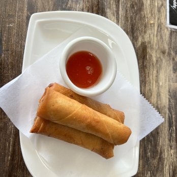 Thai Curry Restaurant - two fried spring rolls with dipping sauce - Thai Near Me - Houston, Texas Thai Curry Restaurant - two fried spring rolls with dipping sauce - Thai Near Me - Houston, Texas