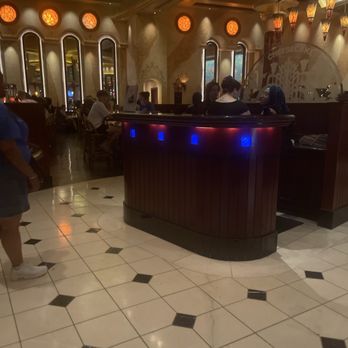 The Cheesecake Factory - Front counter, while guest waited to be served, - New American Near Me - Atlanta, Georgia The Cheesecake Factory - Front counter, while guest waited to be served, - New American Near Me - Atlanta, Georgia