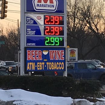 Marathon - a gas station with a sign for beer, wine, and tobacco - Gas Stations Near Me - Clinton Township, Michigan