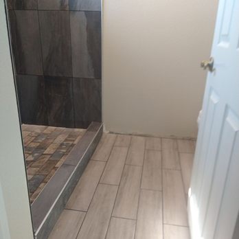 Jrs tile solutions - Unlevel shower curb and large gaps - Flooring Near Me