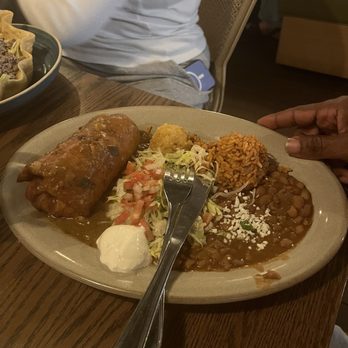 Chi Chi's - Ground beef chimichanga with rice and beans - Mexican Near Me - St Louis Park, Minnesota Chi Chi's - Ground beef chimichanga with rice and beans - Mexican Near Me - St Louis Park, Minnesota