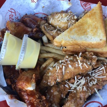 Slim Chickens - 5 wings & 5 chicken tenders with fries and honey mustard dipping sauces - Southern Near Me - Murfreesboro, Tennessee