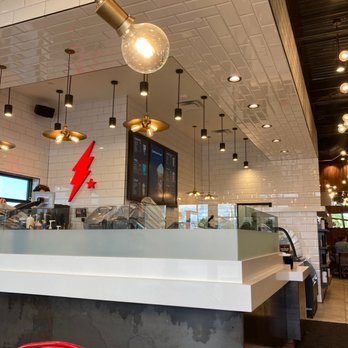 Black Rock Coffee Bar - red chairs at the counter - Coffee & Tea Near Me - Pearland, Texas Black Rock Coffee Bar - red chairs at the counter - Coffee & Tea Near Me - Pearland, Texas