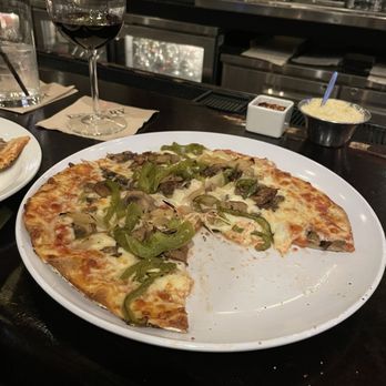 Victory Tap Chicago - Undercooked pizza to compensate for the first burnt one that never made it out - Bars Near Me - Chicago, Illinois
