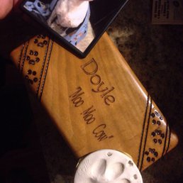 His paw print they suprised me with and his box. His paw print they suprised me with and his box.
