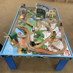 Barnes & Noble Booksellers - They have a cool train table for kids to hang out and play