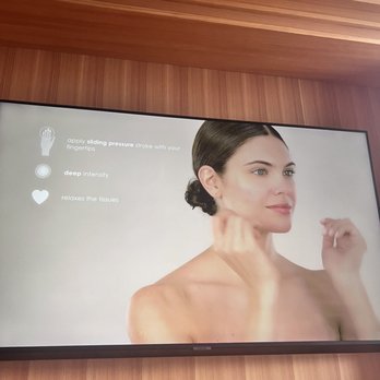QC Spa - Facial massage area. The screen walks you through how to do a proper facial massage. - Massage Near Me - New York, New York