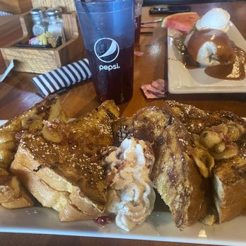 JP's Hideout - Graceland Frenchtoast - peanut butter Banana- and  Milla Alta breakfast burrito- both were amazing. Best breakfast ever! - American Near Me - Cottleville, Missouri