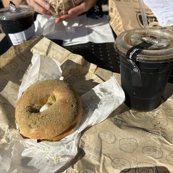 R & A Sourdough - The Hipster (Vegetarian) with bacon added on rosemary sea salt bagel and Metropolis Cold Brew - Bagels Near Me - Chicago, Illinois