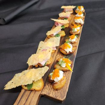 Focacciaza - a variety of appetizers on a wooden board - Italian Near Me - Vancouver, British Columbia Focacciaza - a variety of appetizers on a wooden board - Italian Near Me - Vancouver, British Columbia