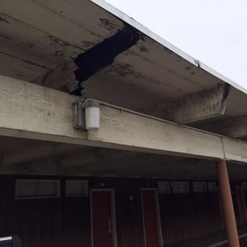 The Village Green - The crumbling carport outside of 601 - Hotels Near Me - Cottage Grove, Oregon The Village Green - The crumbling carport outside of 601 - Hotels Near Me - Cottage Grove, Oregon