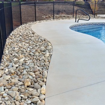Green Leaf Landscapes - Install river rock around a pool - Landscaping Near Me - Inman, South Carolina Green Leaf Landscapes - Install river rock around a pool - Landscaping Near Me - Inman, South Carolina