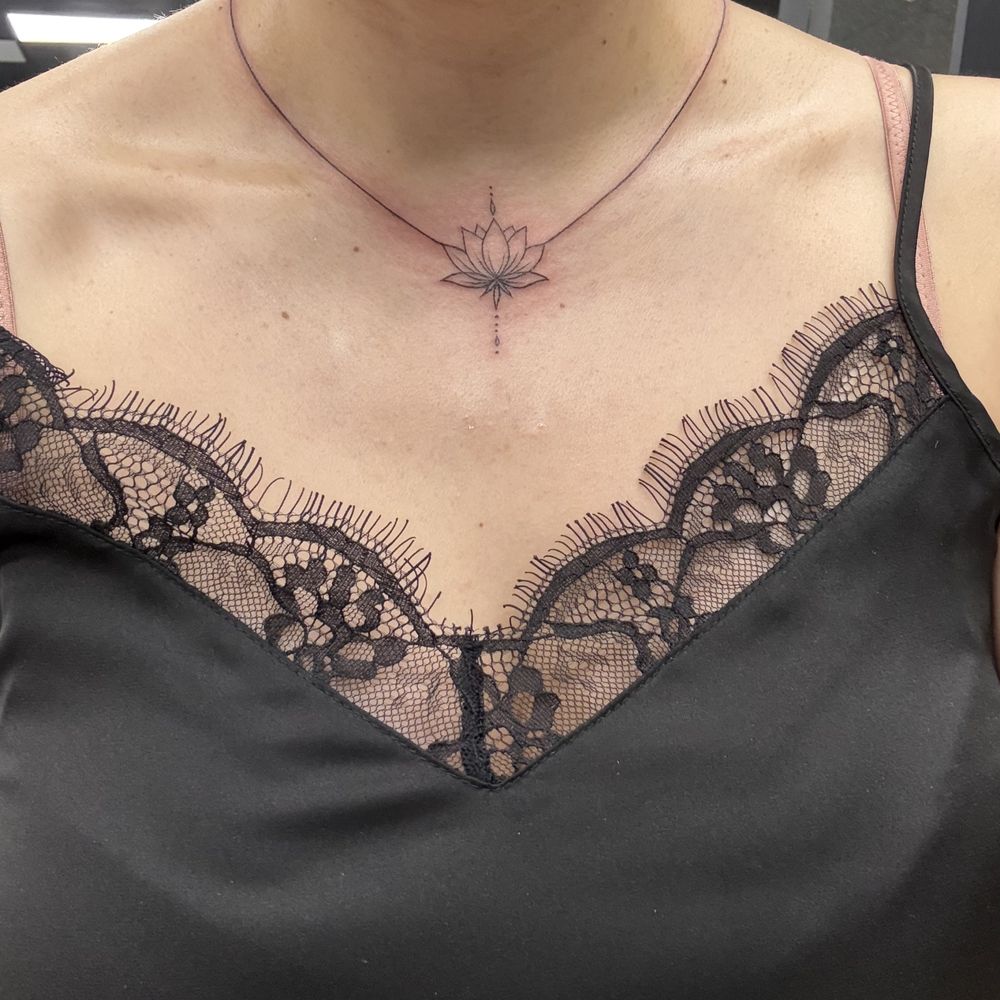 Gee Ink Tattoo - Lotus necklace tattoo by Cici. - Tattoo Near Me - Alhambra, California Gee Ink Tattoo - Lotus necklace tattoo by Cici. - Tattoo Near Me - Alhambra, California