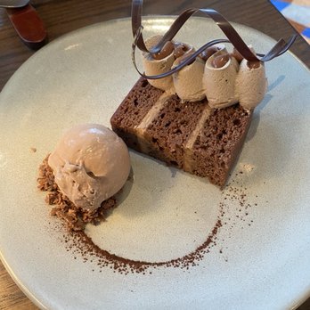 West End Social - Chocolate cake with ice cream - American Near Me - Aspen, Colorado West End Social - Chocolate cake with ice cream - American Near Me - Aspen, Colorado