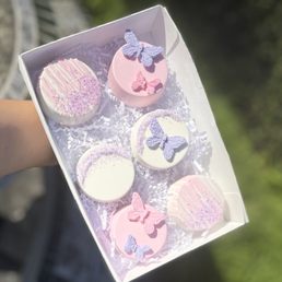 Chocolate cover Oreos with their butter fly molds and chocolate