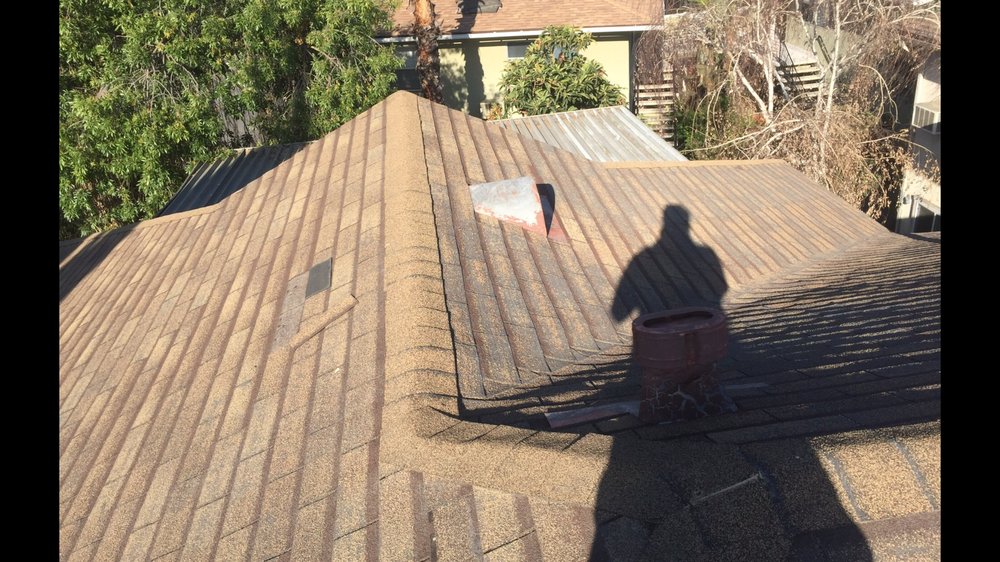 Slide of Ruiz Roofing Construction