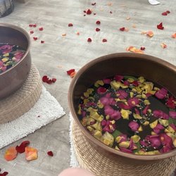Green Leaf Holistic Wellness Center - Soak in our aromatherapy sea salt and flower arrangement foot baths! Or add this to your enhanced couple session.
