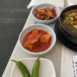 Side dishes. The peppers came with soy bean paste. Side dishes. The peppers came with soy bean paste.