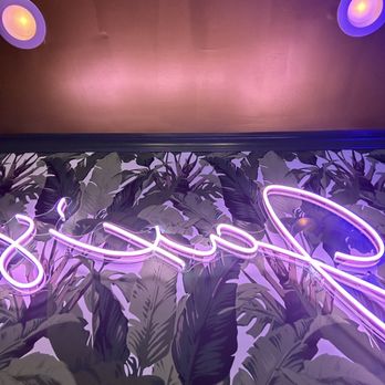 Jax's Studio City - a neon sign in front of plants - Lounges Near Me - Los Angeles, California Jax's Studio City - a neon sign in front of plants - Lounges Near Me - Los Angeles, California
