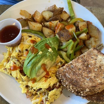 Cafe Topes - T-Scramble: 3 eggs cracked and scrambled with applewood smoked bacon diced with shredded cheddar. - Coffee & Tea Near Me - Carlsbad, California Cafe Topes - T-Scramble: 3 eggs cracked and scrambled with applewood smoked bacon diced with shredded cheddar. - Coffee & Tea Near Me - Carlsbad, California