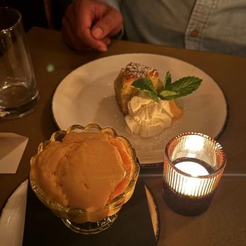 Uva Next Door - orange polenta olive oil cake and mango sorbet - Bars Near Me - New York, New York Uva Next Door - orange polenta olive oil cake and mango sorbet - Bars Near Me - New York, New York