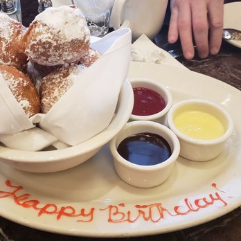 Grand Lux Cafe - Beignets with trio of dipping sauces - American Near Me - Paramus, New Jersey Grand Lux Cafe - Beignets with trio of dipping sauces - American Near Me - Paramus, New Jersey